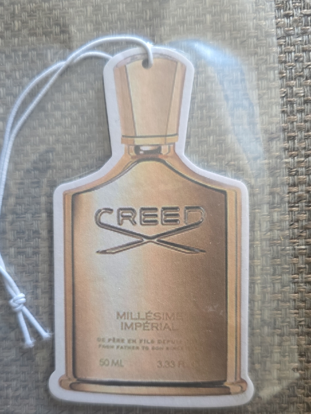 Creed gold bottle car air freshener
